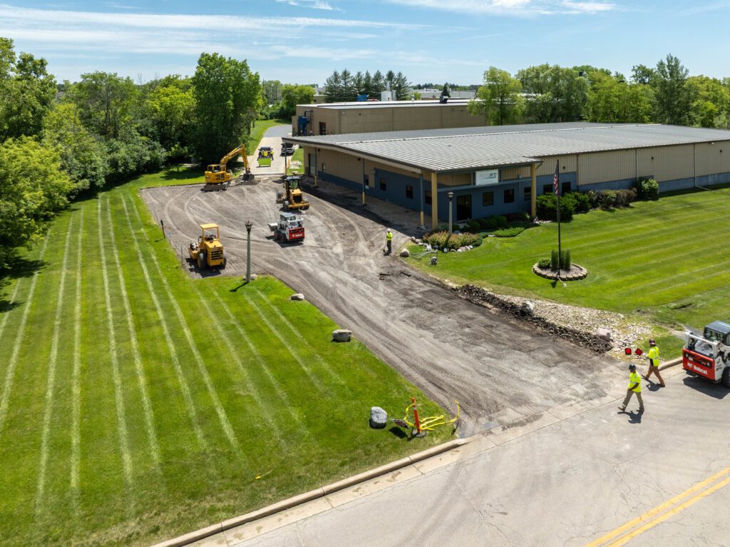 aerial view of driveway being paved