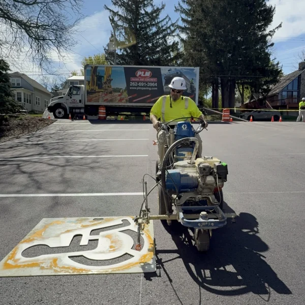ADA Striping PLM Sign in background