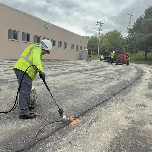 Cleaning the debris with a torch
