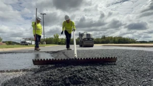 Raking asphalt