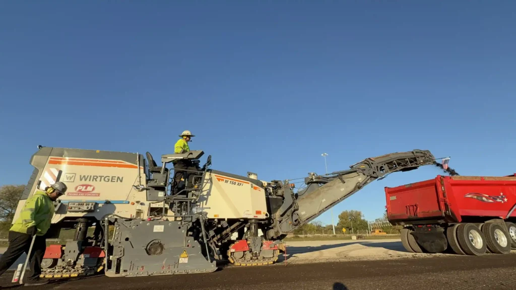 PLM Paving performing asphalt milling services