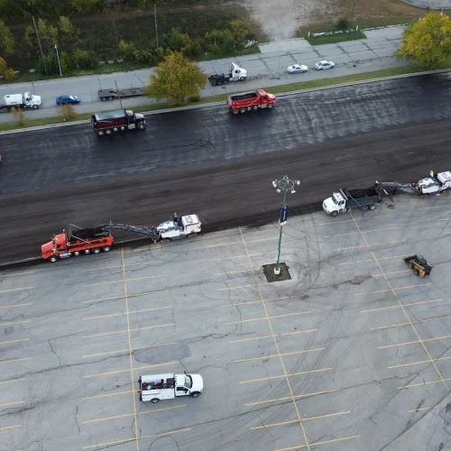Aerial shot of two mills running simultaneously at American Family Field parking lot.