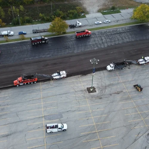Aerial shot of two mills running simultaneously at American Family Field parking lot.