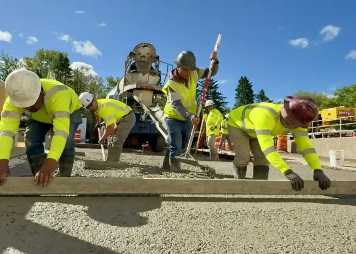 PLM crew laying out a concrete surface
