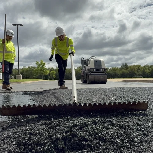 Raking asphalt
