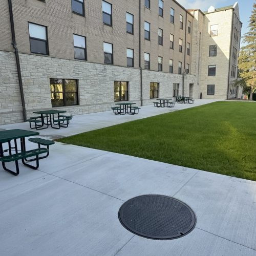 St. Benedicts After Concrete Patio and drainage lid