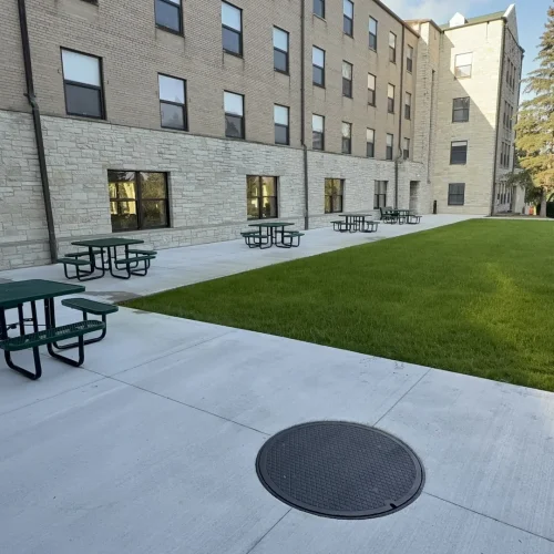 St. Benedicts After Concrete Patio and drainage lid
