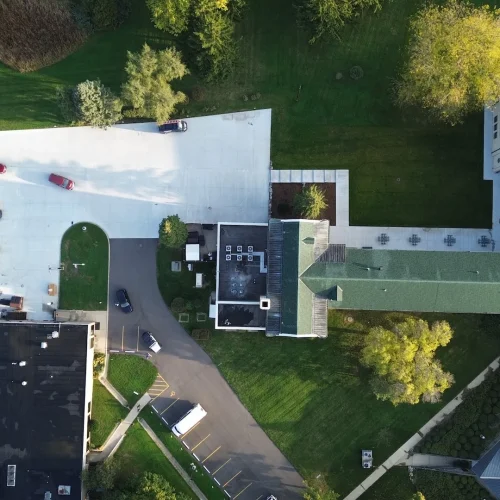 Aerial after shot of concrete, asphalt, drainage and line striping done at St. Benedicts Abbey.