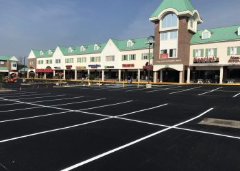newly paved parking lot of a shopping center